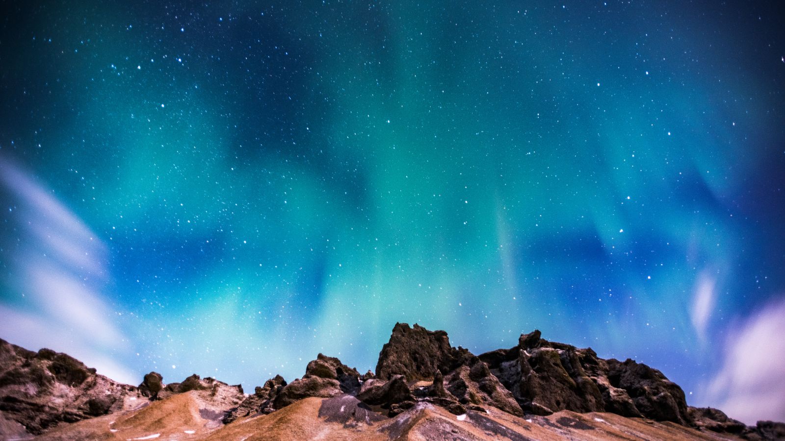 The colourful Northern Lights across the sky in Iceland.