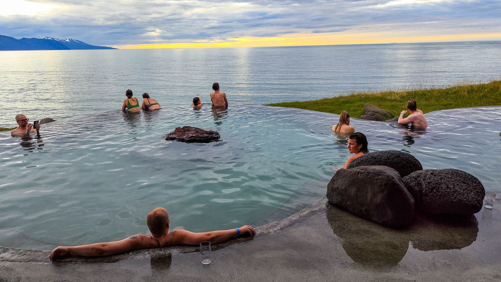 People relaxing in the warm waters of GeoSea in Húsavík.