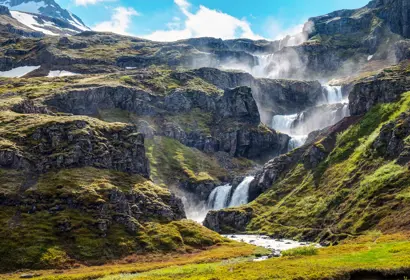 Klifbrekkufossar waterfall in the Mjoifjordur fjord
